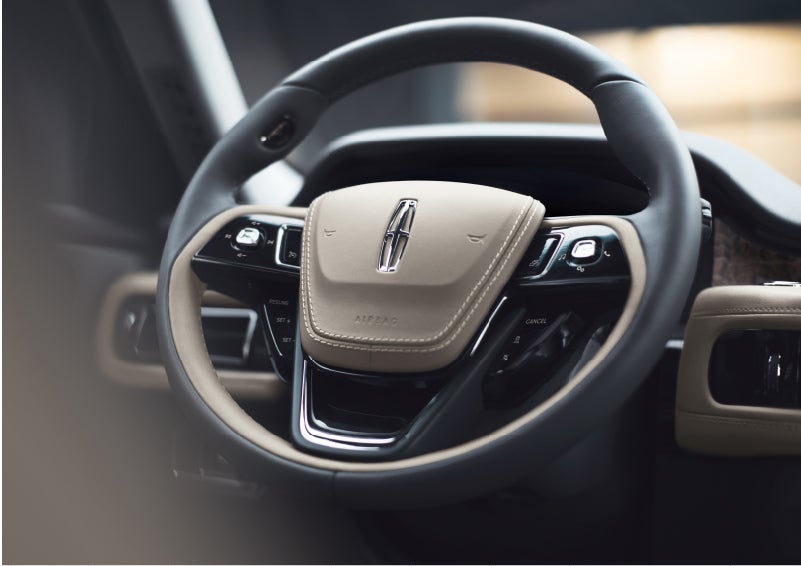 The intuitively placed controls of the steering wheel on a 2023 Lincoln Aviator® SUV | Beach Lincoln in Myrtle Beach SC