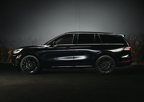 A 2024 Lincoln Aviator® SUV is shown in the Infinite Black exterior color | Beach Lincoln in Myrtle Beach SC