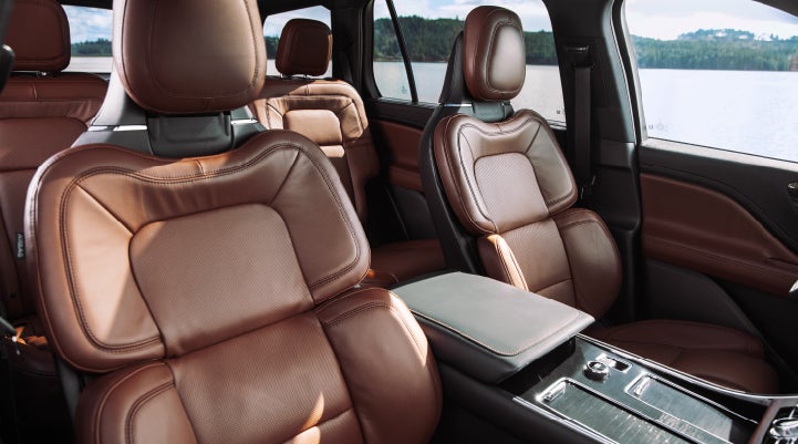 The front row's Perfect Position Seats in a 2024 Lincoln Aviator® Reserve model with Ebony Roast interior | Beach Lincoln in Myrtle Beach SC