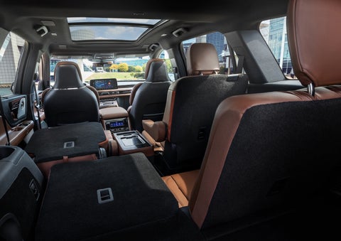 The interior of the 2025 Lincoln Aviator® SUV is shown with two seats folded down for added space. | Beach Lincoln in Myrtle Beach SC