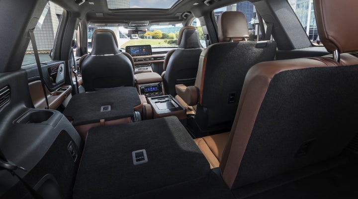 One side of the PowerFold® third-row seat and a second-row seat are folded forward in the 2026 Lincoln Aviator® SUV. | Beach Lincoln in Myrtle Beach SC