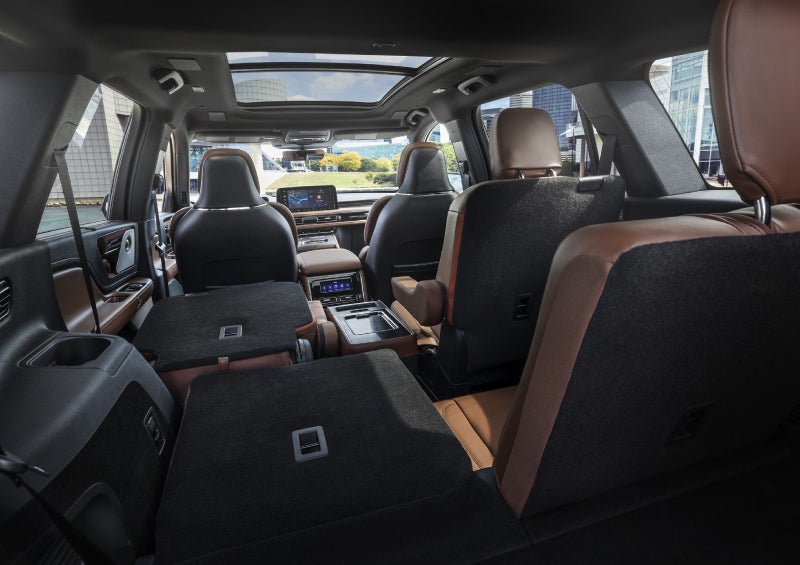 One side of the PowerFold® third-row seat and a second-row seat are folded forward in the 2026 Lincoln Aviator® SUV. | Beach Lincoln in Myrtle Beach SC