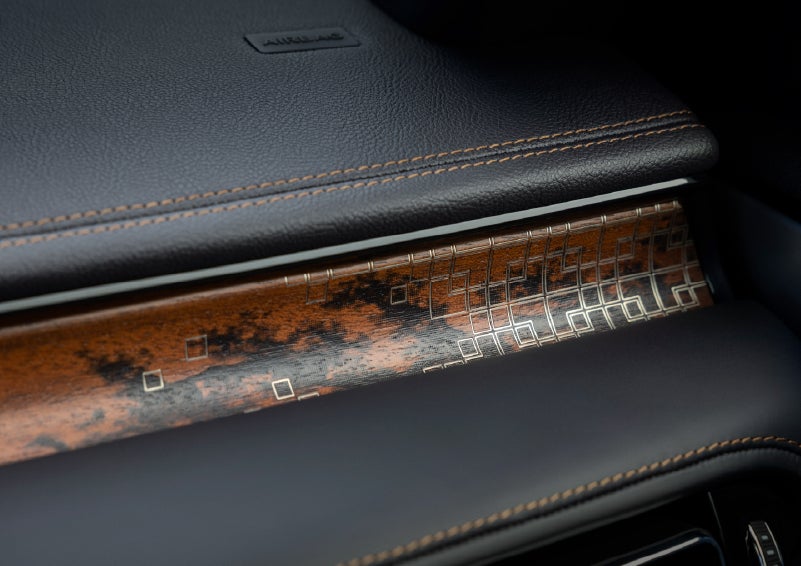 A close-up shot of the 2026 Lincoln Aviator® dashboard with unique black and brown accents and brown stitching. | Beach Lincoln in Myrtle Beach SC