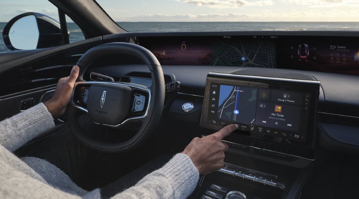 The driver of a 2026 Lincoln Nautilus® SUV interacts with the new Lincoln Digital Experience. | Beach Lincoln in Myrtle Beach SC