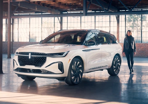A person approaches a 2026 Lincoln Nautilus® SUV. | Beach Lincoln in Myrtle Beach SC