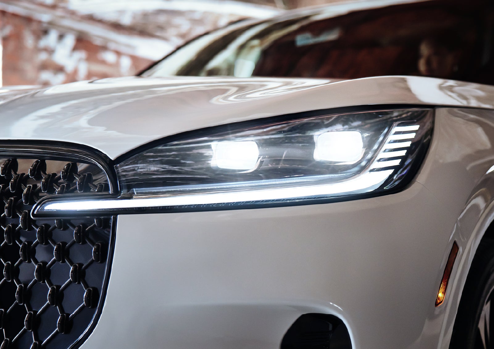 A close-up of a headlamp on the 2027 Lincoln Aviator® SUV is shown. | Beach Lincoln in Myrtle Beach SC