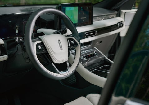 The leather-trimmed steering wheel of a 2027 Lincoln Aviator® Black Label™ SUV. | Beach Lincoln in Myrtle Beach SC